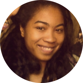 me smiling holding my computer